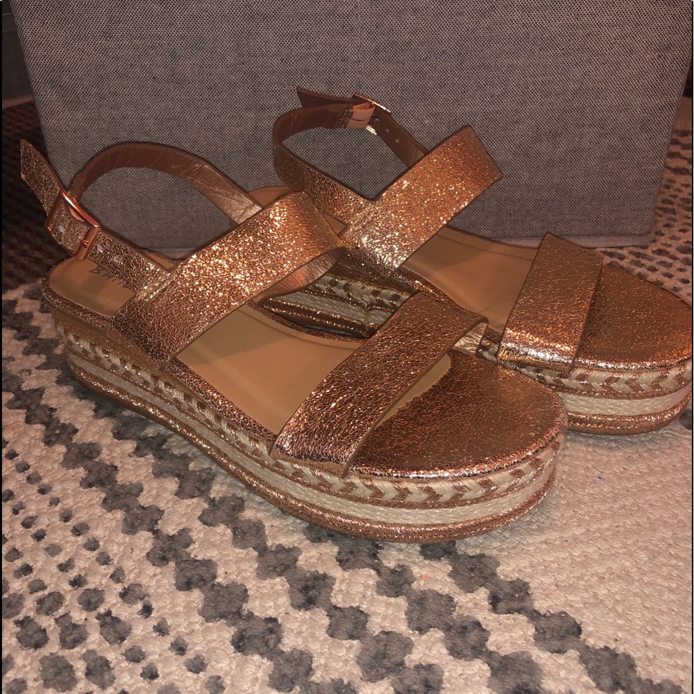 Platform sandals.